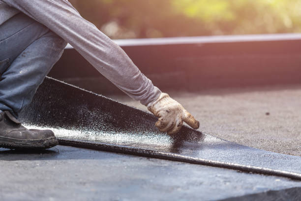 Professional Waterproofing technician working in San Pierre, IN